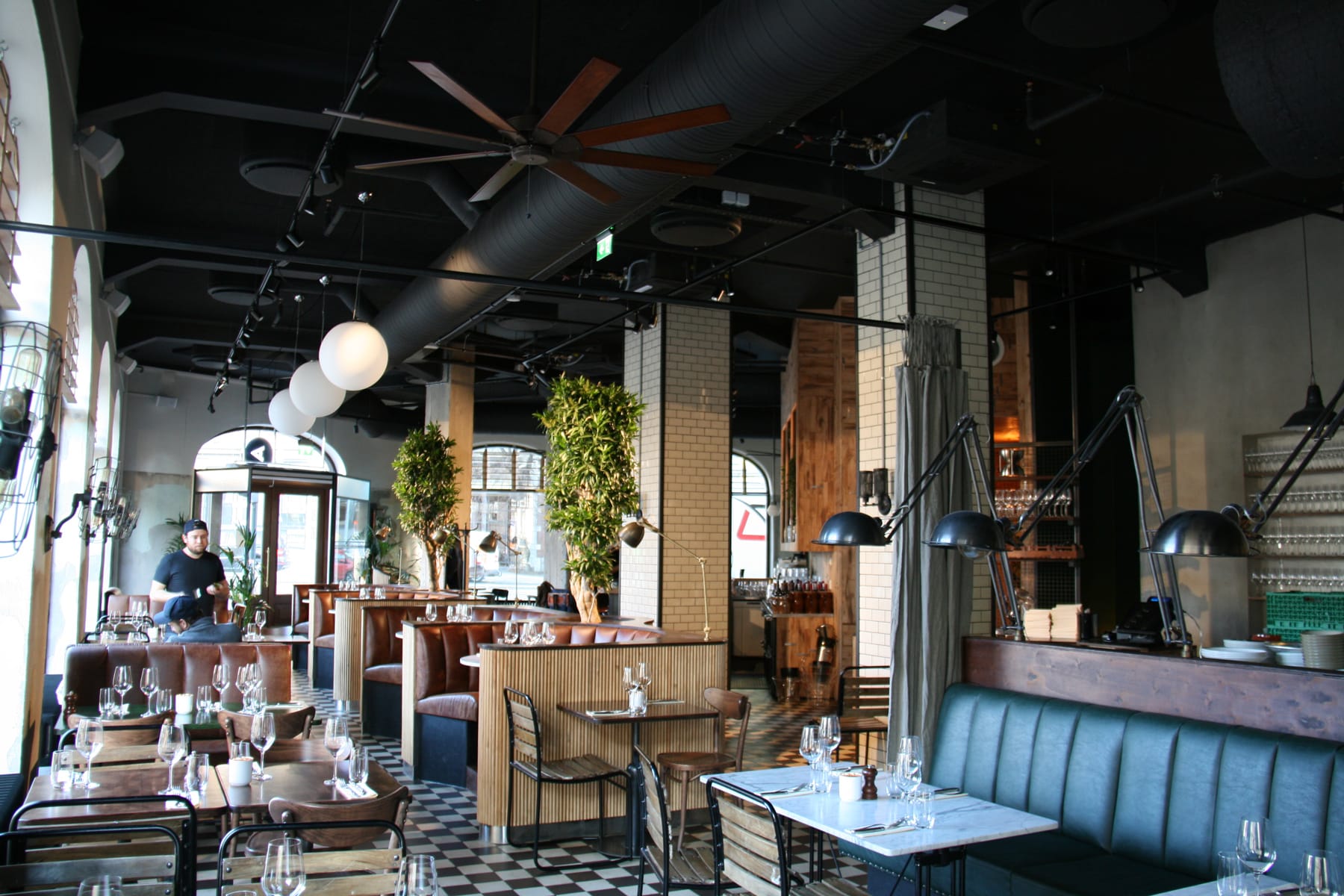 Black sound-absorbing panels in the ceiling of Amerigo restaurant