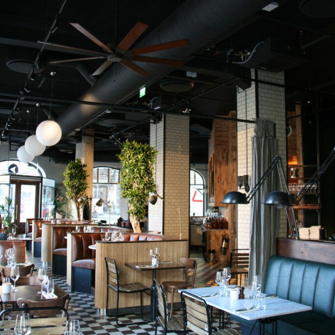 Black sound-absorbing panels in the ceiling of Amerigo restaurant